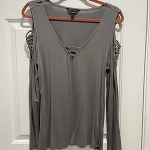Long sleeve shirt with shoulder cut outs